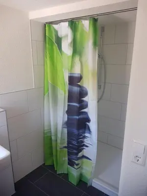 Ein Badezimmer in der Unterkunft Ferienwohnungen Lamm Spiegelberg-Jux
