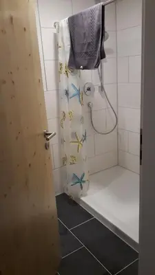 Ein Badezimmer in der Unterkunft Ferienwohnungen Lamm Spiegelberg-Jux