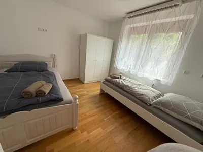 Ein Bett oder Betten in einem Zimmer der Unterkunft Ferienhaus Barbara