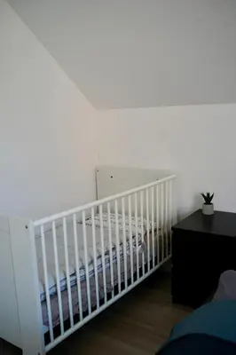 Ein Bett oder Betten in einem Zimmer der Unterkunft PrimeBnb Schönbrunn