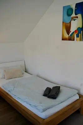 Ein Bett oder Betten in einem Zimmer der Unterkunft PrimeBnb Schönbrunn