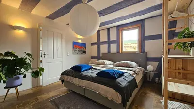 Ein Bett oder Betten in einem Zimmer der Unterkunft Designerwohnung im preisgekrönten Denkmal