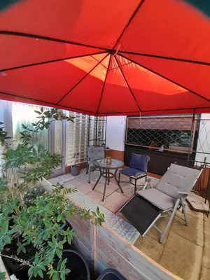 Ein Patio oder anderer Außenbereich in der Unterkunft Apartment am Palmenhaus