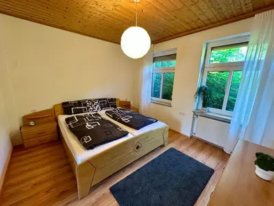 Ein Bett oder Betten in einem Zimmer der Unterkunft Ferienwohnung Boxberg