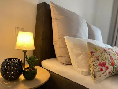 Ein Bett oder Betten in einem Zimmer der Unterkunft Ferienwohnung an der Mainpromenade