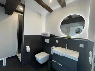 Ein Badezimmer in der Unterkunft Ferienwohnung an der Mainpromenade