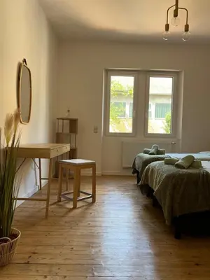Ein Bett oder Betten in einem Zimmer der Unterkunft Villa Mediterrane - Apartment Milan
