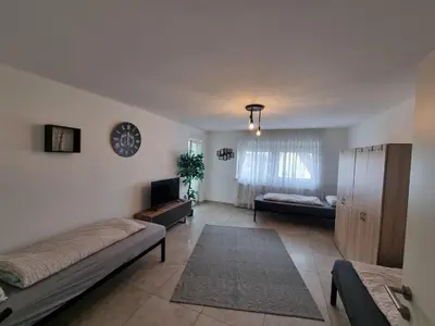Ein Bett oder Betten in einem Zimmer der Unterkunft Residence Apartments