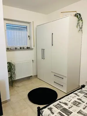 Ein Bett oder Betten in einem Zimmer der Unterkunft Tanjas Home