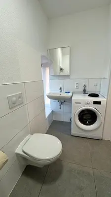 Ein Badezimmer in der Unterkunft Böhl Station 1 Zimmer-Wohnungen