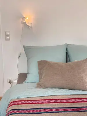 Ein Bett oder Betten in einem Zimmer der Unterkunft Ferienwohnung am Park