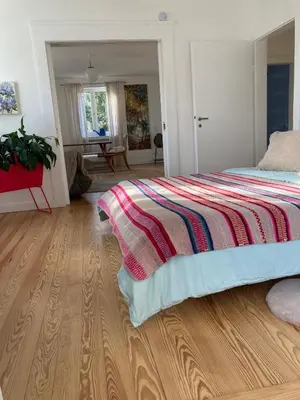 Ein Bett oder Betten in einem Zimmer der Unterkunft Ferienwohnung am Park