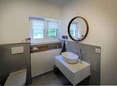 Ein Badezimmer in der Unterkunft Ferienwohnung am Park