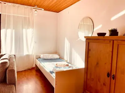 Ein Bett oder Betten in einem Zimmer der Unterkunft Odw homes - Wohnung im Landhaus mit Terrasse