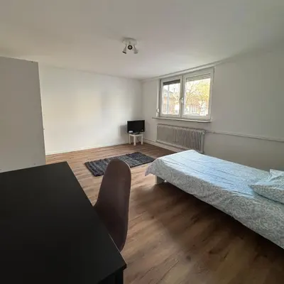 Ein Bett oder Betten in einem Zimmer der Unterkunft Monteurzimmer Wohnung in Heilbronn und Umgebung