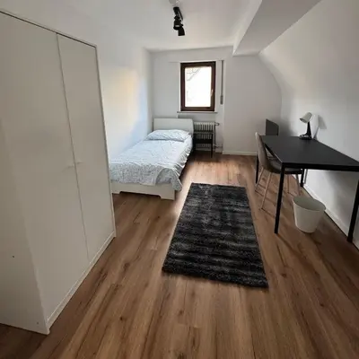 Ein Bett oder Betten in einem Zimmer der Unterkunft Monteurzimmer Wohnung in Heilbronn und Umgebung