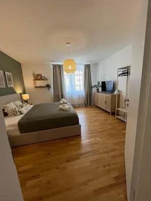 Ein Bett oder Betten in einem Zimmer der Unterkunft Gemütliches Apartment I Mitten in der Stadt Aschaffenburg I 5 Min HBF I Gegenüber City Galerie