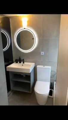 Ein Badezimmer in der Unterkunft Sufo Apartment