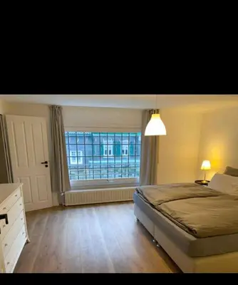 Ein Bett oder Betten in einem Zimmer der Unterkunft Sufo Apartment