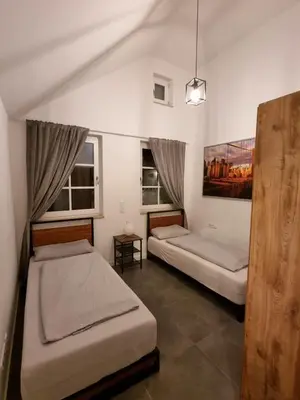 Ein Bett oder Betten in einem Zimmer der Unterkunft Residence Apartments