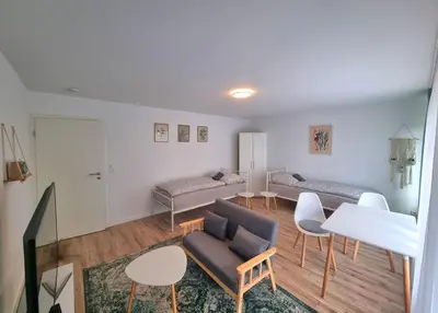 Ein Sitzbereich in der Unterkunft Residence Apartments