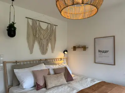 Ein Bett oder Betten in einem Zimmer der Unterkunft SchwarzwaldQuartier Dobel