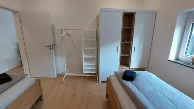 Ein Bett oder Betten in einem Zimmer der Unterkunft Ferienwohnung Zur Hofreite Fewo 5