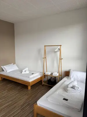 Ein Bett oder Betten in einem Zimmer der Unterkunft Pension Albert - möblierte Einzel- und Doppel- Zimmer auf Zeit
