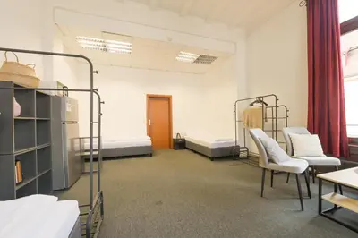 Ein Bett oder Betten in einem Zimmer der Unterkunft G-Living Wilhelmstraße