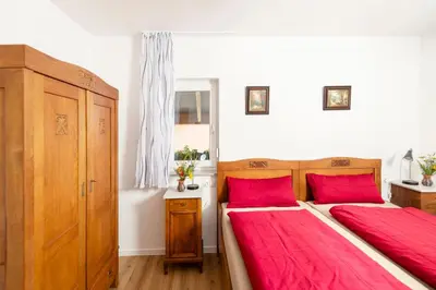 Ein Bett oder Betten in einem Zimmer der Unterkunft Ferienhof Obertor Heuboden