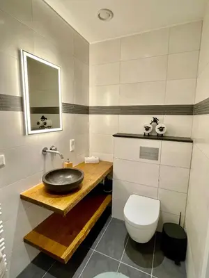 Ein Badezimmer in der Unterkunft Moderne gemütliche Wohnung - zentral und naturnah