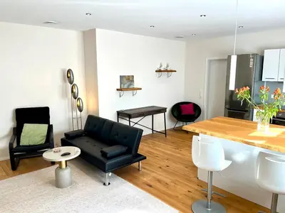 Ein Sitzbereich in der Unterkunft Moderne gemütliche Wohnung - zentral und naturnah