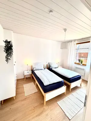 Ein Bett oder Betten in einem Zimmer der Unterkunft Ferienwohnung in Lorsch mit Garten