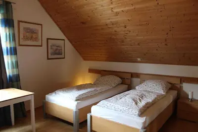Ein Bett oder Betten in einem Zimmer der Unterkunft Ferienhaus in Reilingen