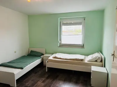 Ein Bett oder Betten in einem Zimmer der Unterkunft Apartment Aschaffenburg