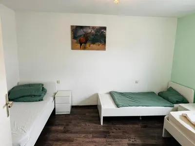 Ein Bett oder Betten in einem Zimmer der Unterkunft Apartment Aschaffenburg