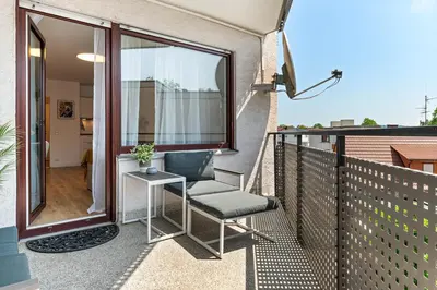 Ein Balkon oder eine Terrasse in der Unterkunft Goldstadt Pop-Art Apartment