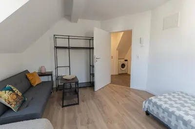Ein Sitzbereich in der Unterkunft G-Living - Theodor Heuss Str