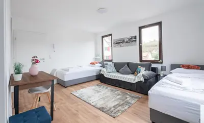 Ein Bett oder Betten in einem Zimmer der Unterkunft G-Living - Theodor Heuss Str