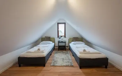 Ein Bett oder Betten in einem Zimmer der Unterkunft G-Living - Theodor Heuss Str