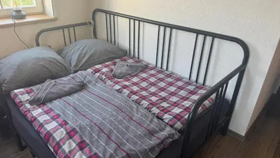 Ein Bett oder Betten in einem Zimmer der Unterkunft Gästezimmer in Großbottwar Zentrum