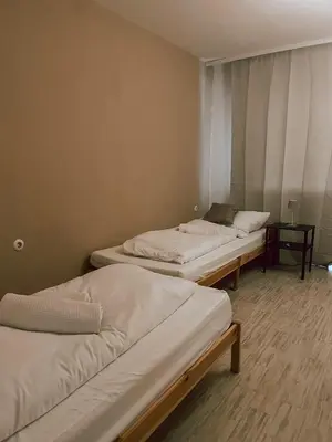 Ein Bett oder Betten in einem Zimmer der Unterkunft DoreyHome HN1 - Stilvolles Apartment zentral in Heilbronn - 7 Personen - WLAN