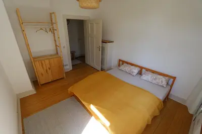 Ein Bett oder Betten in einem Zimmer der Unterkunft cozy Bunsi