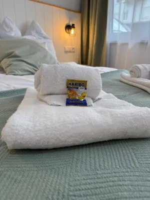 Ein Bett oder Betten in einem Zimmer der Unterkunft Sali Homes Apartmenthaus Schlossgasse