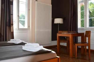 Ein Bett oder Betten in einem Zimmer der Unterkunft Gästehaus stuttgART36