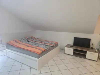 Ein Bett oder Betten in einem Zimmer der Unterkunft Wohnung- ideal für beruflich unterwegs