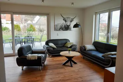 Ein Sitzbereich in der Unterkunft Ferienhaus Rebenhof