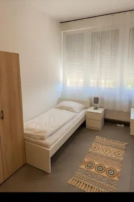 Ein Bett oder Betten in einem Zimmer der Unterkunft Ok Apartments