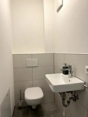 Ein Badezimmer in der Unterkunft Nur 9 Min zu Fuß ins Zentrum I Balkon I Netflix