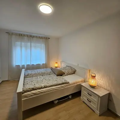 Ein Bett oder Betten in einem Zimmer der Unterkunft Gesamte Unterkunft für bis zu 3 Personen